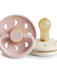 FRIGG Moon Natural Rubber Pacifier 2-Pack, baby essentials shown from different angles.