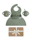 Mushie Christmas Bunny Feeding Kit with a bunny-patterned bib, suction plate, and two cups.