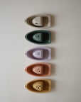 Mushie Bath Boats: 5 pastel, stackable, non-toxic boats for fun bath time play.