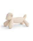 The mushie Lamb Figurine Teether is a minimalist, cream-colored lamb toy made from food-grade silicone with smooth curves, ideal as a baby teether or playful figurine, set against a plain white background.