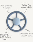 The mushie Suction Spinner Toy is a blue silicone wheel with five spokes, designed for babies. It spins for sensory fun, supports fine motor skills, is BPA/BPS/PVC/Phthalate-free, and suctions to most smooth surfaces.