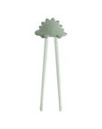Mushie Training Chopsticks in Dried Thyme, ideal for toddler self-feeding, on white background.