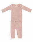 Mushie Two Piece Set: light pink organic cotton baby shirt & pants, laid flat on white.