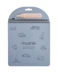 The mushie Reusable Water Color Pad in Vehicles features simple vehicle illustrations, a top spiral binding, and includes a beige water pen—ideal for mess-free painting and eco-friendly art activities.