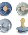 FRIGG Natural Rubber Pacifier 4-Pack: four blue and green textured natural rubber pacifiers.
