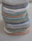 Lifestyle image of the Bath Mitt collection