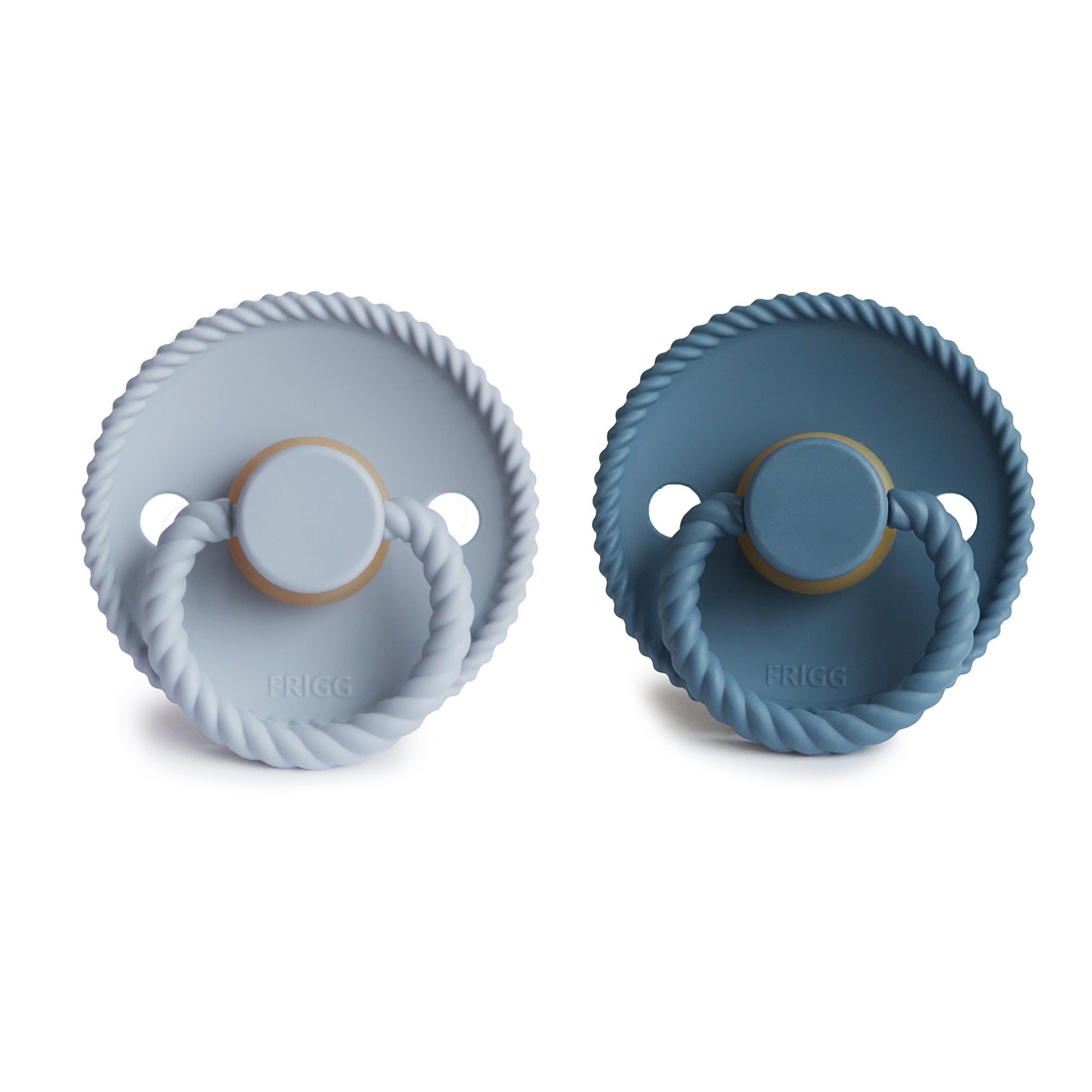 Two Frigg Moon Rubber pacifiers in Powder Blue and Ocean View with rope design on a shield on a white background