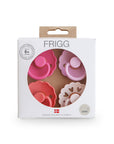 Packaged pink and red Rosy Romance Frigg baby pacifiers on a white background