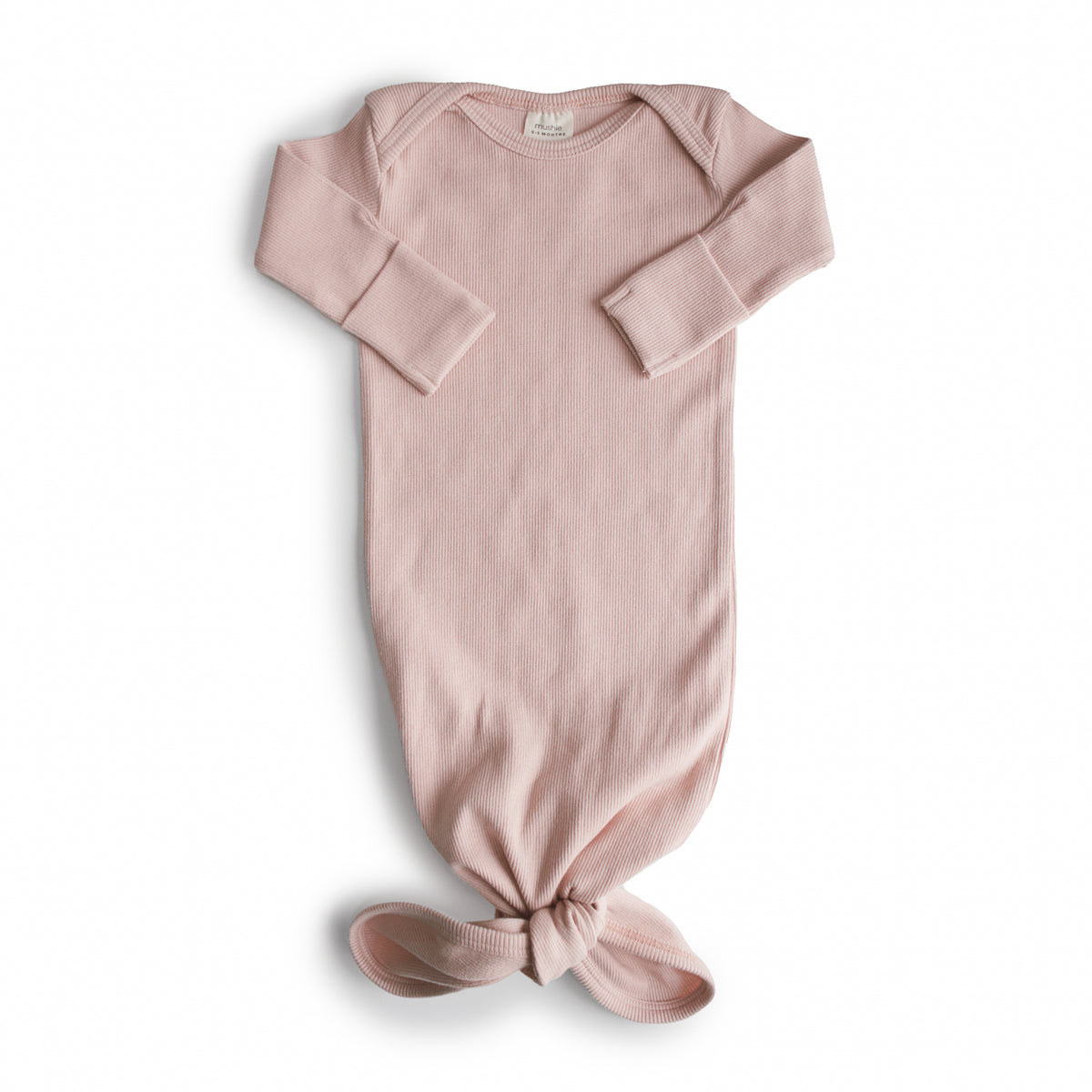 Blush-colored organic cotton Ribbed Knotted Baby Gown with a knotted hem.