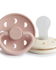 FRIGG Moon Silicone Pacifier 2-Pack in pink and white, baby essentials with round shields.