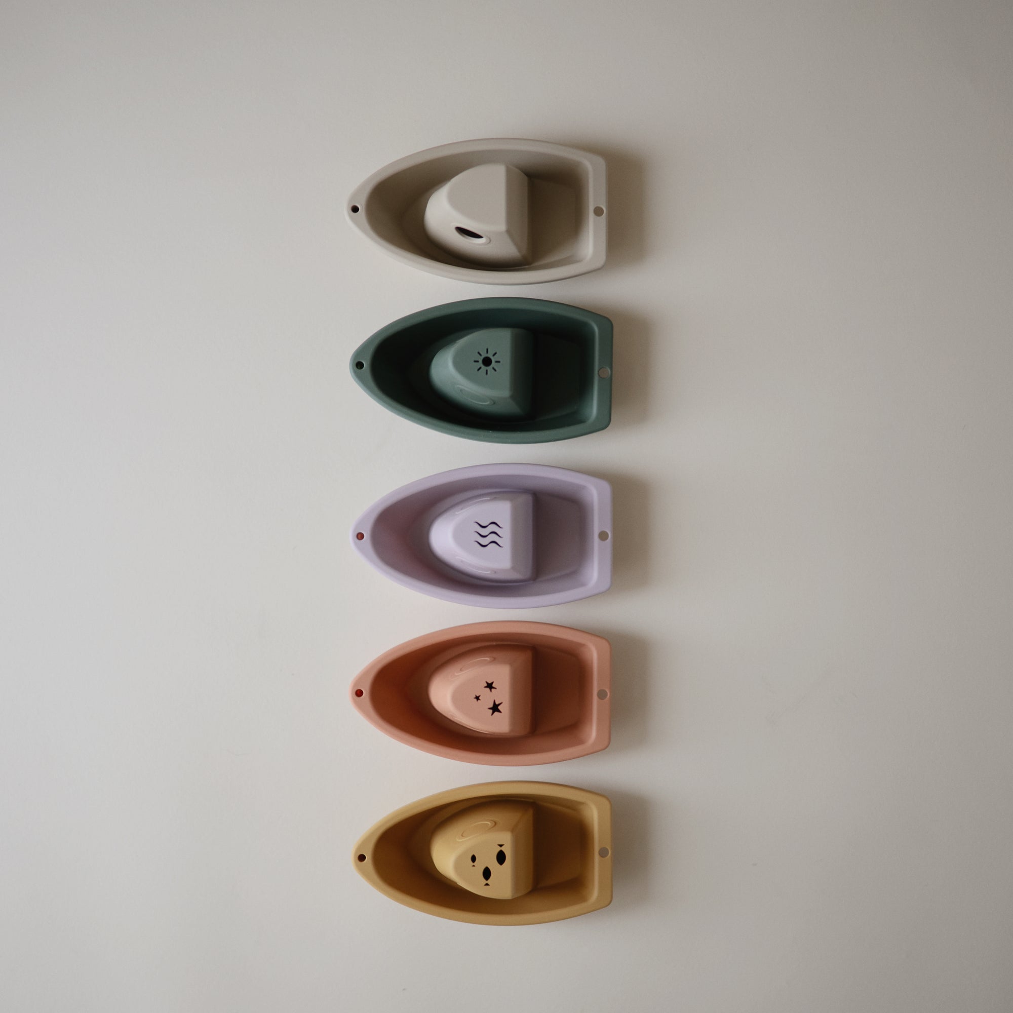 Mushie Bath Boats: 5 pastel, stackable, non-toxic boats for fun bath time play.