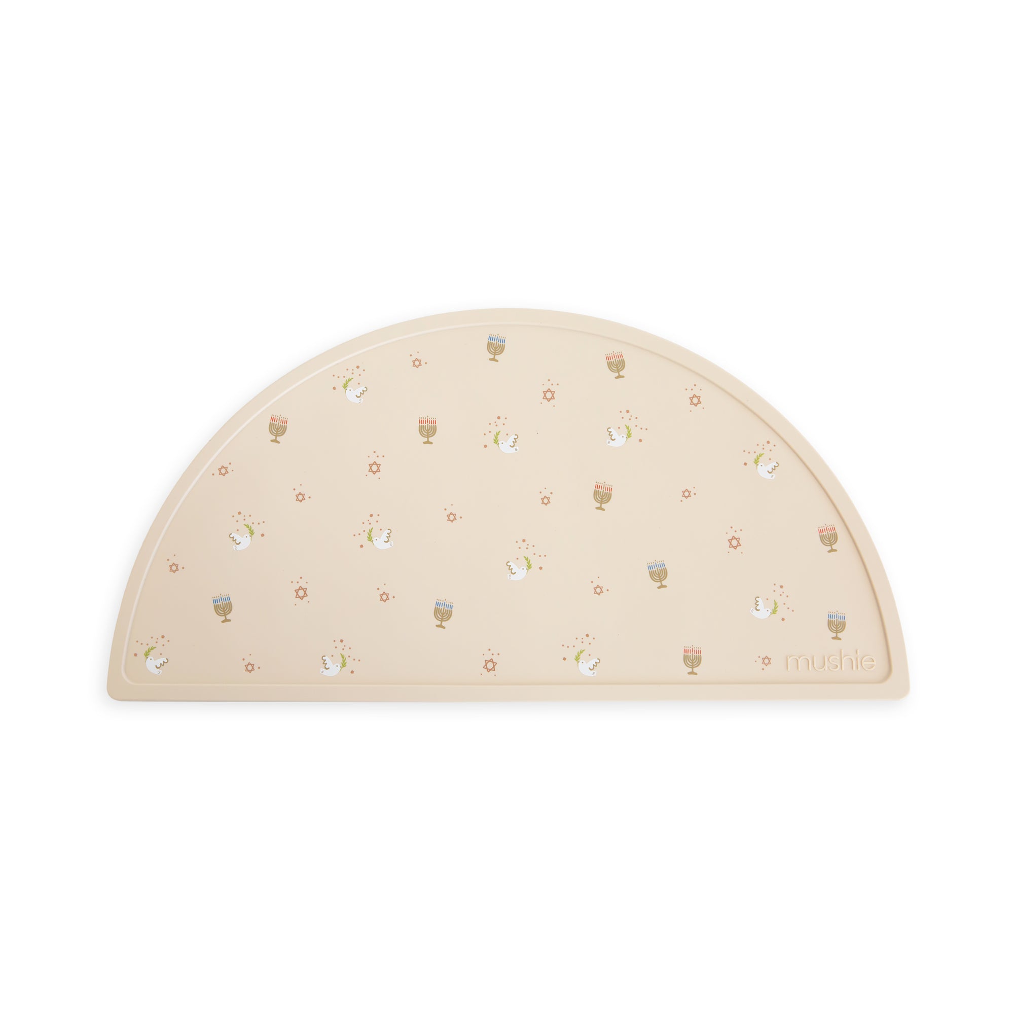 Mushie Silicone Placemat: Beige, semicircle, food-grade with small rainbow and sun patterns.
