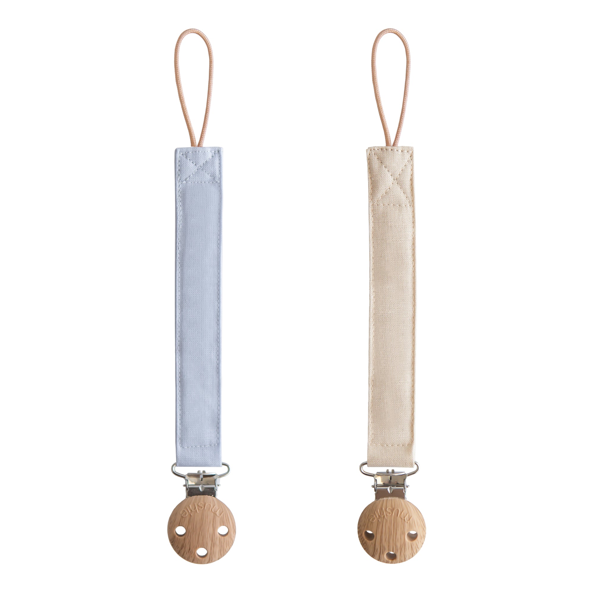 Mushie Linen Pacifier Clip 2-Pack: light blue &amp; beige clips with wooden clasps, side by side.