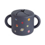 Mushie Snack Cup, Planets: spill-proof silicone, two handles, toddler-friendly.