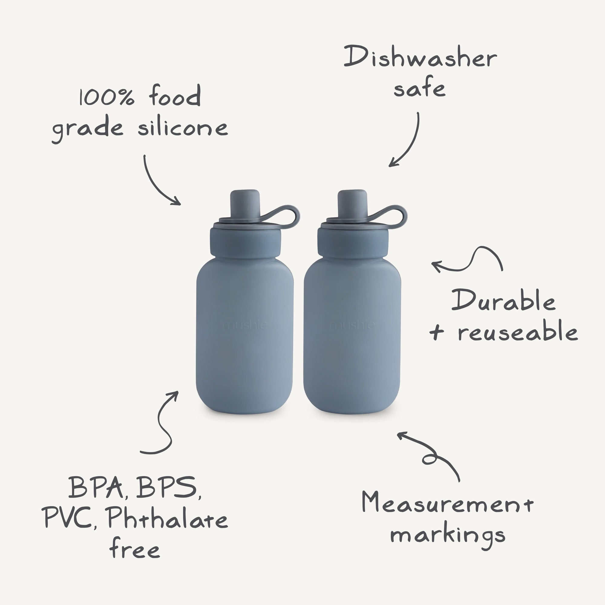 Two blue Silicone Puree Pouches by mushie are shown. Made from 100% food-grade silicone, they're BPA/BPS/PVC/phthalate free, dishwasher safe, durable, and reusable—perfect for mess-free feeding.