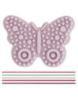 Mushie Silicone Sensory Toy: pink butterfly shape with 5 pastel straws for fine motor play.