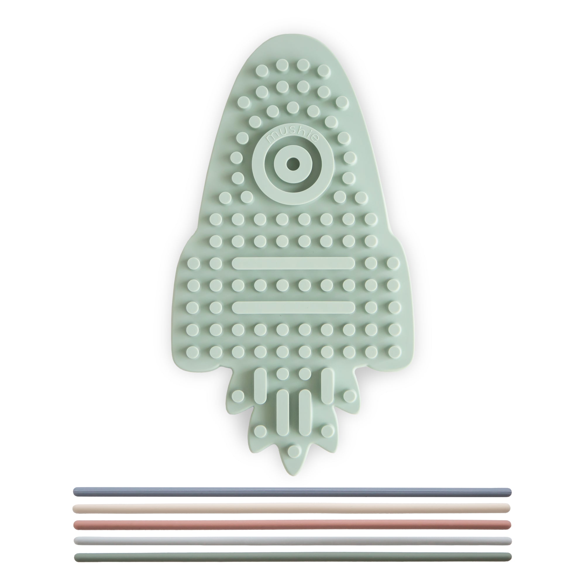 Mushie Silicone Sensory Toy: light green rocket mat with textured bumps and six colored straws.