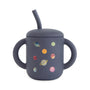 Mushie Silicone Training Cup + Straw, navy, two handles, food grade, colorful planet design.