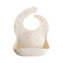 Mushie Silicone Baby Bib, cream with stars, adjustable neck & easy to clean.