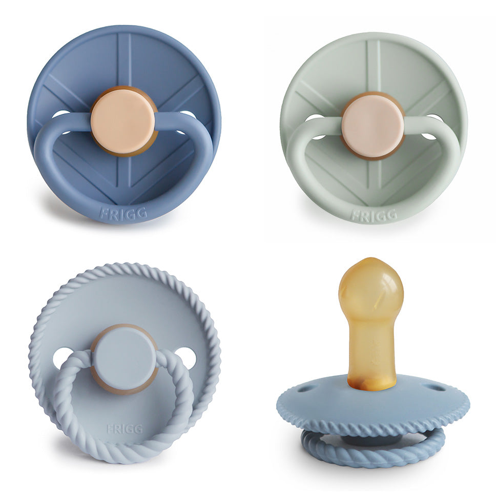 FRIGG Natural Rubber Pacifier 4-Pack: four blue and green textured natural rubber pacifiers.