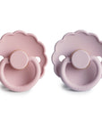 FRIGG Daisy Natural Rubber Pacifier 2-Pack in soft pink and lavender with latex nipples.
