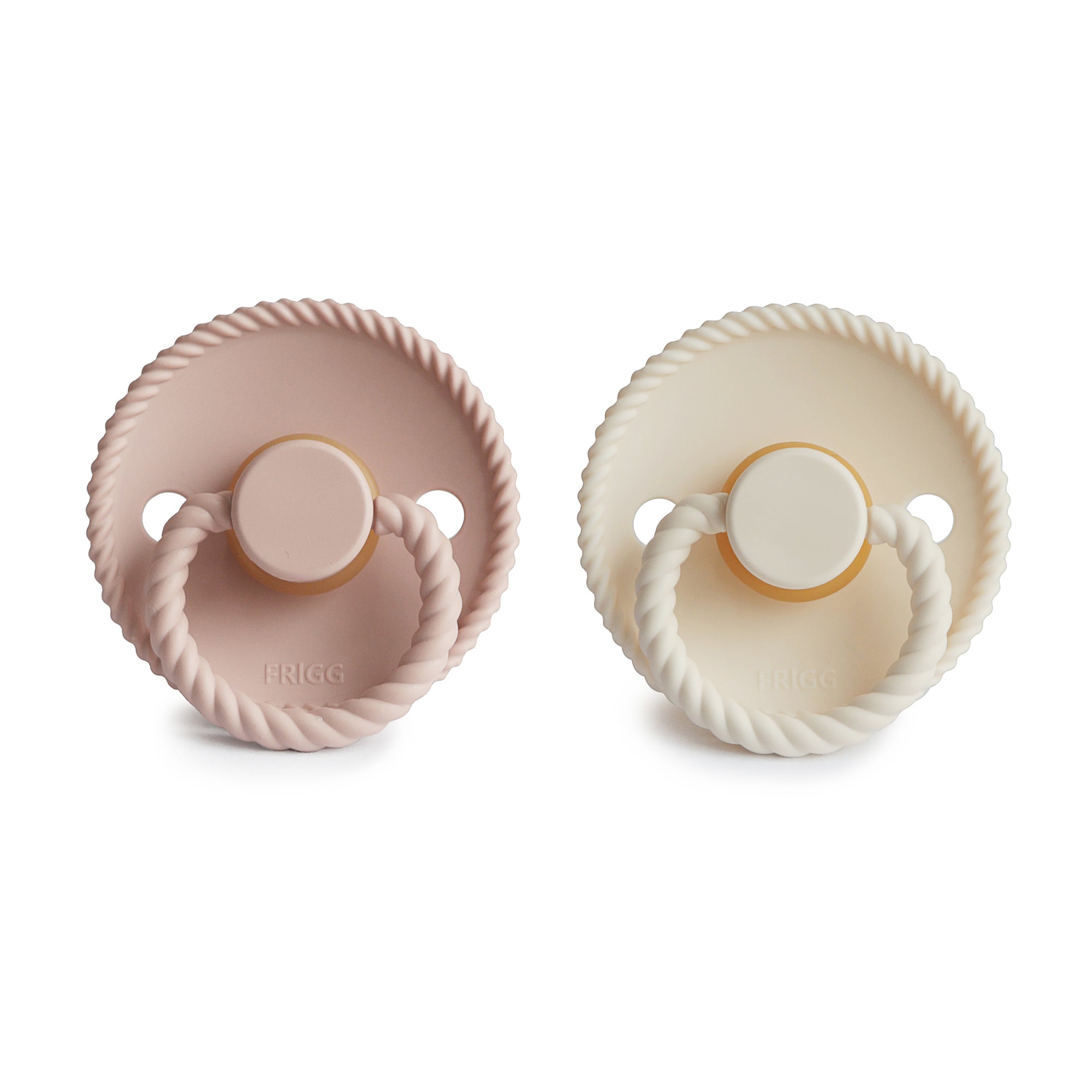 Mushie FRIGG Rope Natural Rubber Pacifier 2-Pack in pink and cream on a white background.
