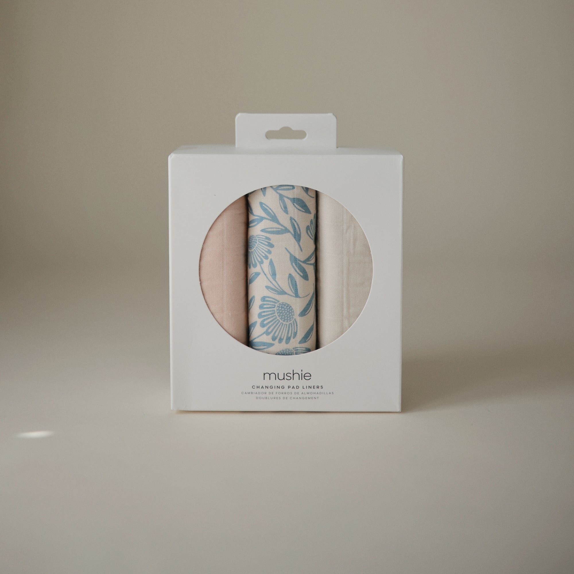 Mushie Changing Pad Liners, 3-pack, in white box—one features blue floral print, window visible.