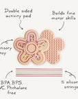 Mushie Silicone Sensory Toy: flower-shaped, labeled features, safe non-toxic silicone.