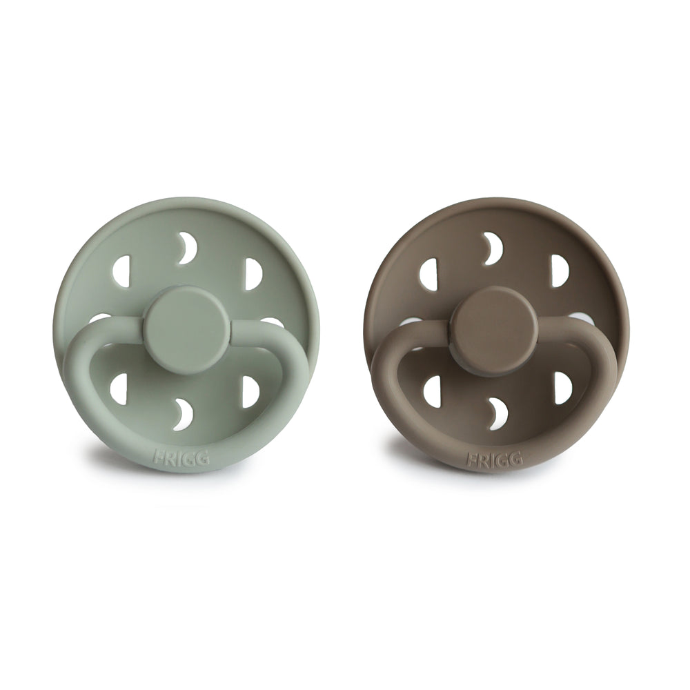 Front view of Sage and Portobello Moon Silicone Frigg pacifiers. 